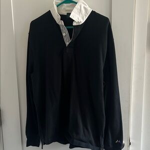 J.Crew Men’s Black rugby shirt with striped placket.